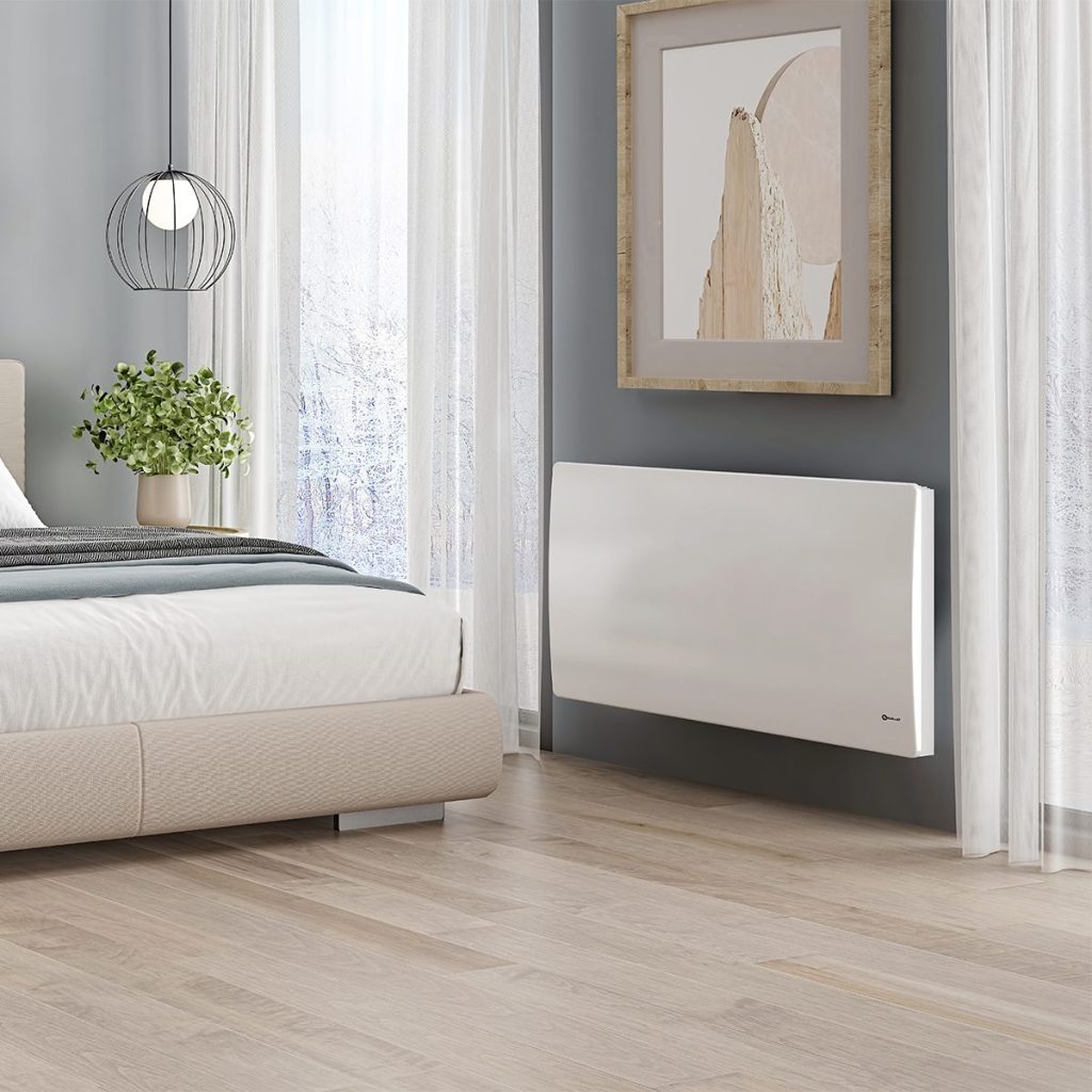 Ouellet electric convector in a bedroom